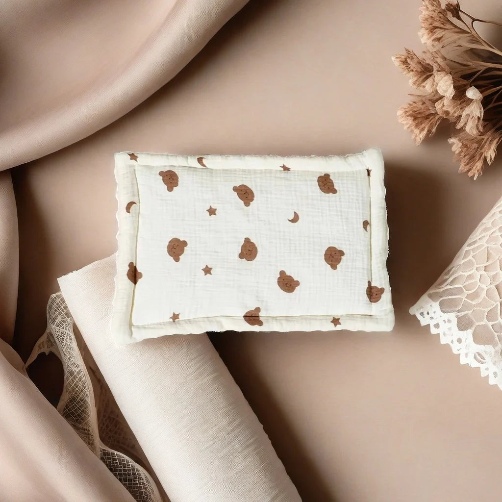 Breathable pillow for babies 0-12 months - hypoallergenic and safe material.