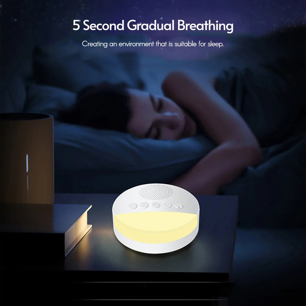 Baby sound machine with white noise and soft night light - portable for travel.