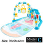Musical activity mat for children - baby gym with lights, sounds and hanging toys.