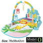 Musical activity mat for children - baby gym with lights, sounds and hanging toys.