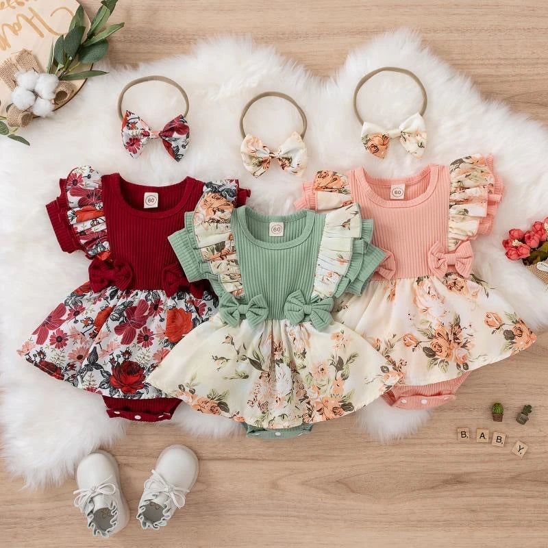 Girls' jumpsuit dress with front bow in red, green, and pink - floral and striped print for summer.