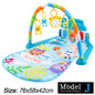 Musical activity mat for children - baby gym with lights, sounds and hanging toys.