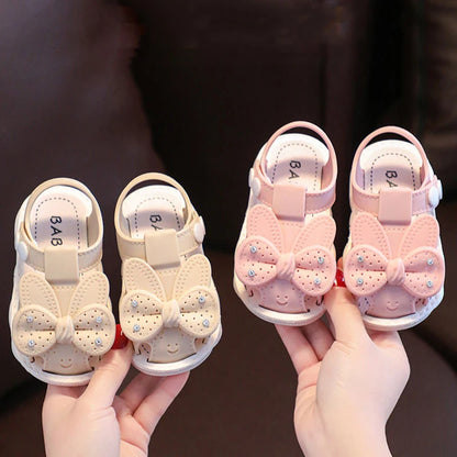 Baby sandals with bow - Pink and beige colors for babies 0 to 24 months.