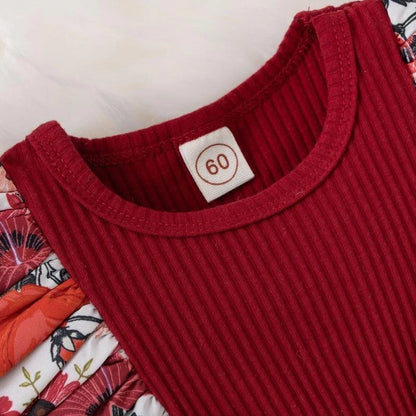 Girls' red jumpsuit dress with front bow - floral and striped print for summer.